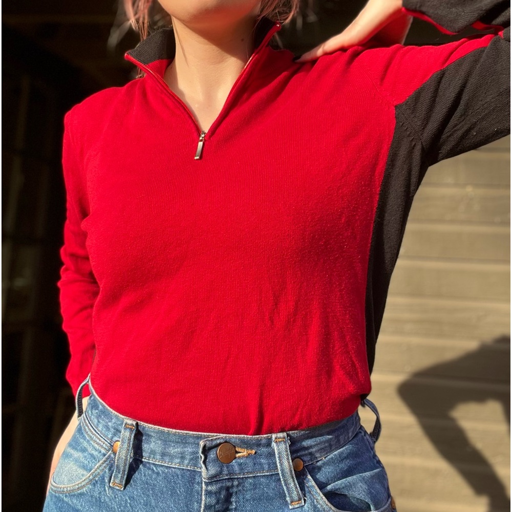 Red and black zip collar sweater